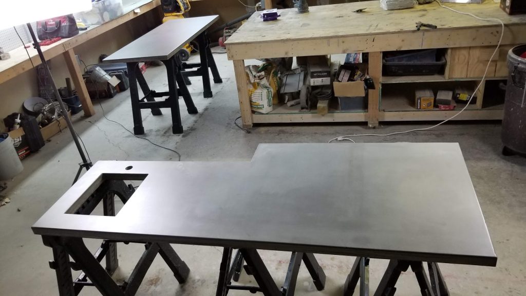 Countertops during production in Blue Earth Studio. The opening is for an undermount bar sink.